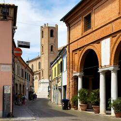 The Cathedral of San Cassiano at the end of the street — Comacchio, Italy.