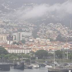 Perched on the hills, hiding in the clouds