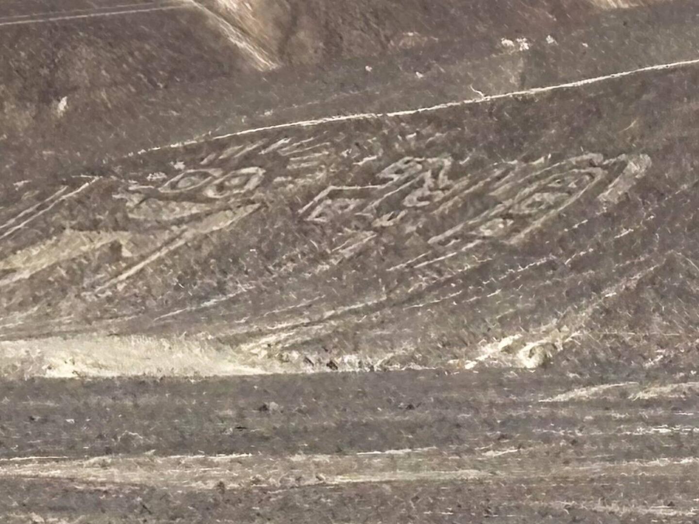 Before the Nascas there were the Paracas, older etchings but on hills not flat ground