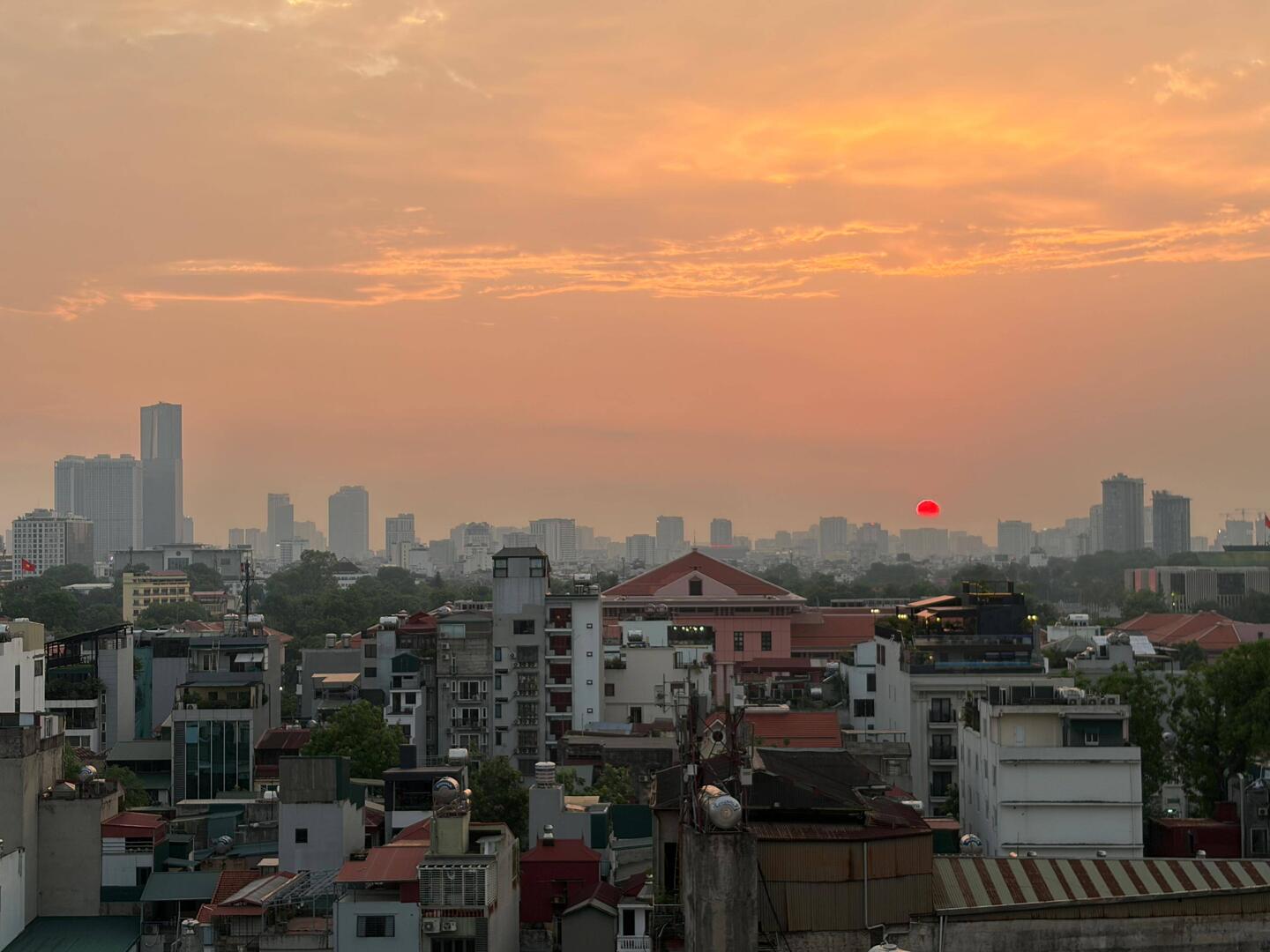 The sun sets in Hanoi