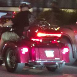 Cool trike that we both took photos of but in the glare of the night lights this was the best image
