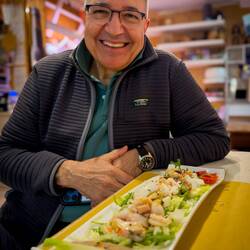 Mui can't wait to dig into his frutti di mare at Il Pizzicante — Comacchio, Italy.