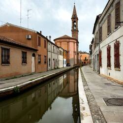 Church of the Rosary in the distance — Comacchio, Italy.