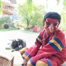 The narrator of the yak dance. Very funny.