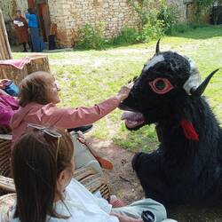 Cindy petting the yak during the yak dance