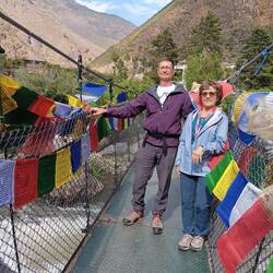 On the new pedestrian bridge next to the 15th century chain bridge