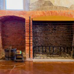 One of the niches and fireplaces in the cooking hall — Manifattura dei Marinati.