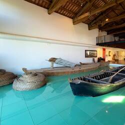 Original eel pots and the boats used to catch eels — Manifattura dei Marinati.