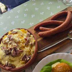 Local Sausage and polenta with telemea cheese and slow cooked sheep.