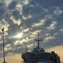 Sun on a warship in Brindisi