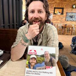 Jordan and the flyer for AJ's fundraiser