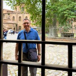 Mui's off to buy groceries ... behind him is Basilica di San Vitale — Ravenna, Italy.