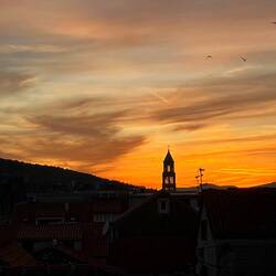 Le coucher de soleil depuis la fenêtre de notre appartement