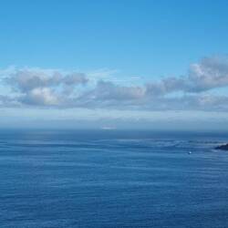 Sentinel Peak looms above the sealed colony at Hout Bay. The ship is the one we'll be boarding.