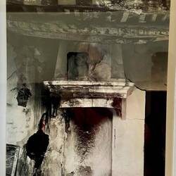 Photo of the fireplace in the ruins of our house before it was renovated