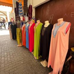 The colors of the clothing are vibrant, and the material is lightweight