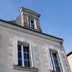 Looking up to our attic window from street level, with a little bit of help from the zoom lens