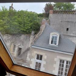 View through our bathroom skylight window towards the tuffeau cliffs and more windows