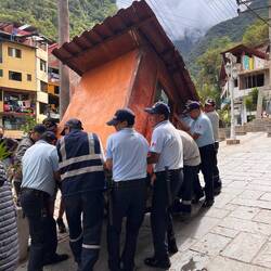 Watching people move a kiosk by muscle