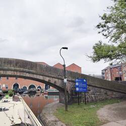Signs towards the Ashton and Huddersfield Narrow Canals making sure we turn the right way
