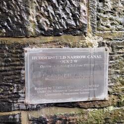 The canal was restored bit by bit. Locks have plaques at boat level commemorating their reopening