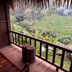 Our room felt like luxury, a large window and balcony framing a travel magazine view.