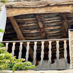The first wooden balustrades we are aware of seeing outside. Years ago, they were all wooden.
