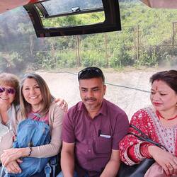On the cable car with couple celebrating 25th anniversary