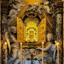 Our Lady of Sweat ... believed to have sweat blood after the painting was stabbed by a soldier.