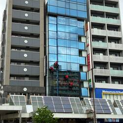 Daredevil window washers across from my Sugano Station