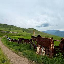 NZ farm fence is typically made from #8 wire. Here, they're made of the rusted carcasses of old cars