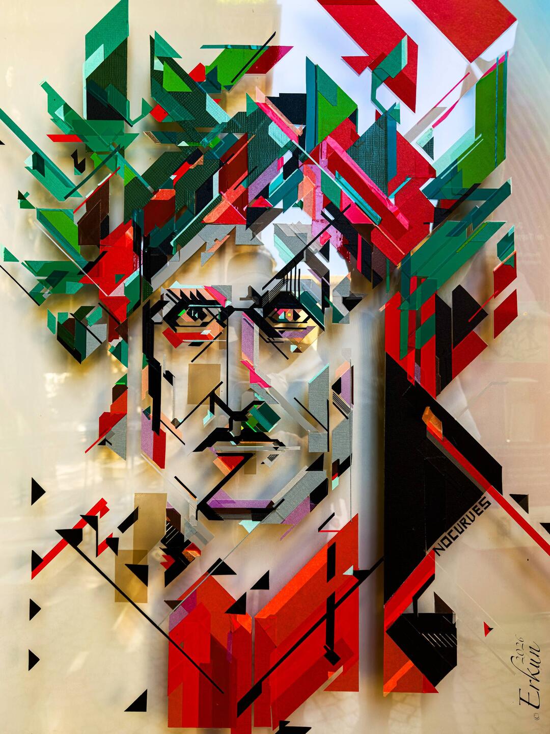 "No Curves" is an Italian tape artist who creates stylized, geometric portraits of Dante.