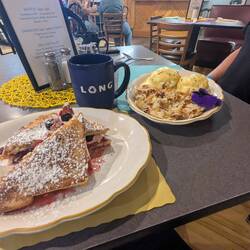 Our breakfast - cream cheese and berry stuffed French toast and smoked salmon Benedict.