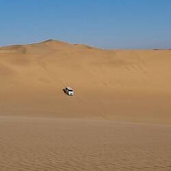 The dunes stretch for hundreds of km. A Toyota 4WD people mover in our group.