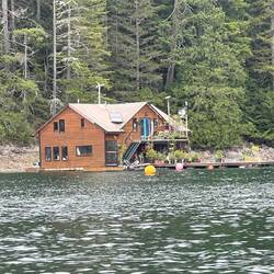 Very nice home in Squirrel Cove. Looks like a fish farm as well.
