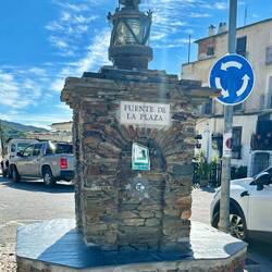 The lighthouse lantern signifies this is a port city, although it's nowhere near the sea.