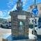 The lighthouse lantern signifies this is a port city, although it's nowhere near the sea.