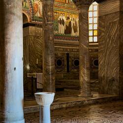 The Justinian mosaic panel through the columns ... Basilica di San Vitale — Ravenna, Italy.