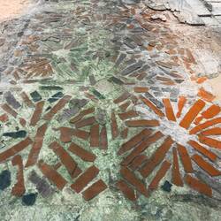 Under-floor of amphorae over which the marble elements would have been placed.