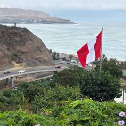 Peruvian flag flying over the bicentennial plaza