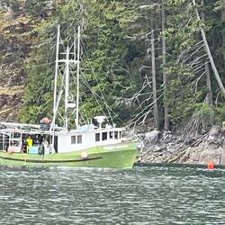 Fishing boat setting prawn traps.