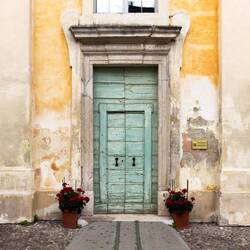 Charmed by the door of the Chiesa dei Santi Giovanni e Paolo — Ravenna, Italy.