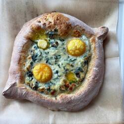 Georgian dish Adjaruli khachapuri