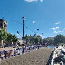Risen above the concrete walls to see the lock beam sundial commemorating reopening the canal.