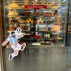 Beautiful cakes displayed in a store window