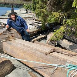 Mike excited about this chainsaw sawed log