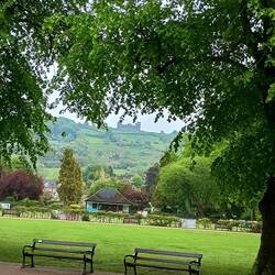 The classic view up to Riber Castle framed by fresh spring greenery