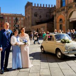 Bride & Groom and Ring Bearer ... with a cute Fiat Cinquecento ... Piazza Maggiore — Bologna, Italy.