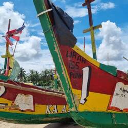 Beautiful wooden fishing boats pulled up on the beach. Not for show. These were out this morning.