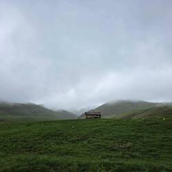 Farmer's shelter in clouds
